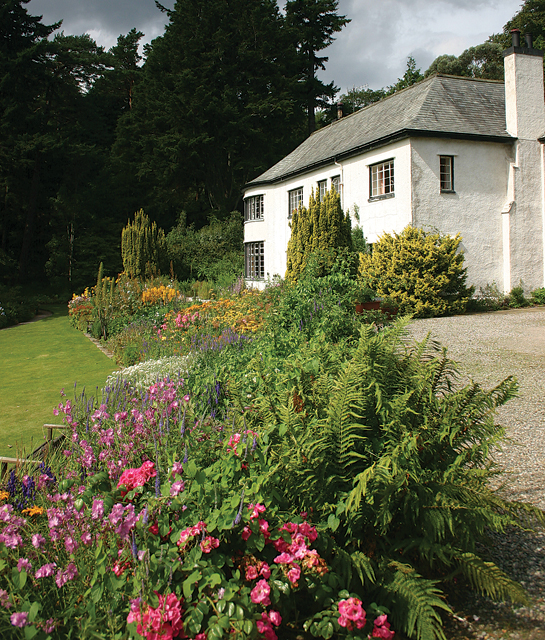 The best way to provide eye-catching interest to a curbside landscape is to make it a merry mix of colors, textures and heights.