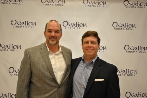 Rob Collins, Carmike’s Chief Marketing Officer, with Scott Manning, president of the Holly Springs Chamber of Commerce.