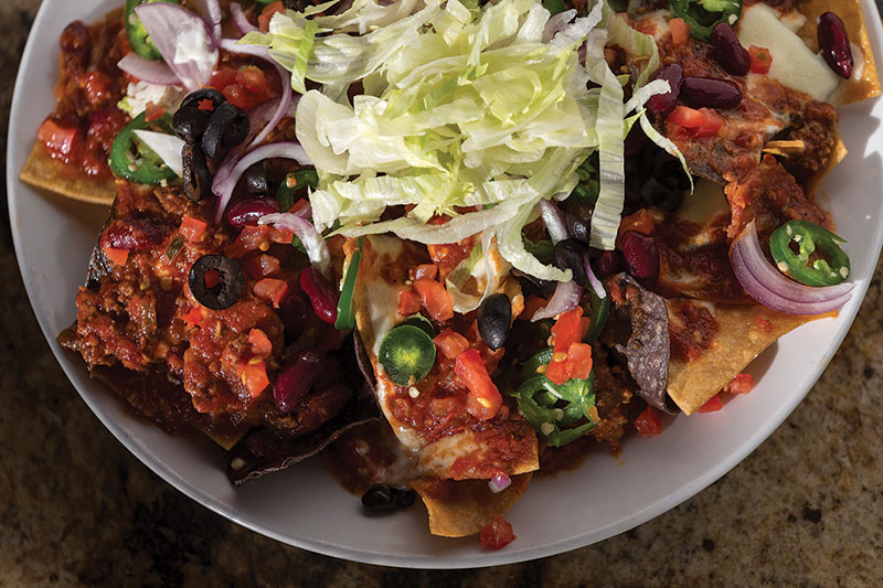 Choose your own toppings to customize the Ruckus Nachos. 