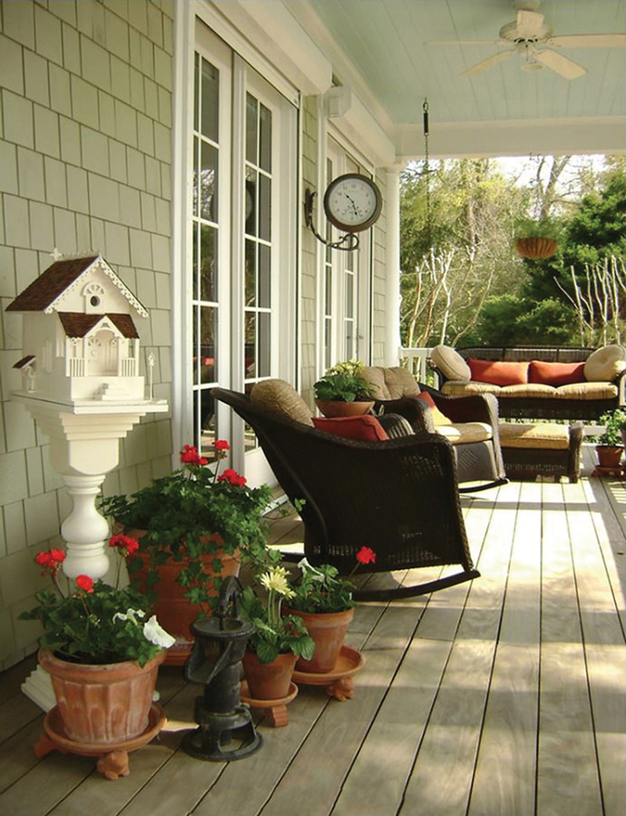 An extra-wide front porch overlooking the Intracoastal Waterway is a standout feature on a Wilmington home designed by Eddie Rider. The homeowners enjoy the relaxed pace of watching the boats pass and the tides roll in and out.