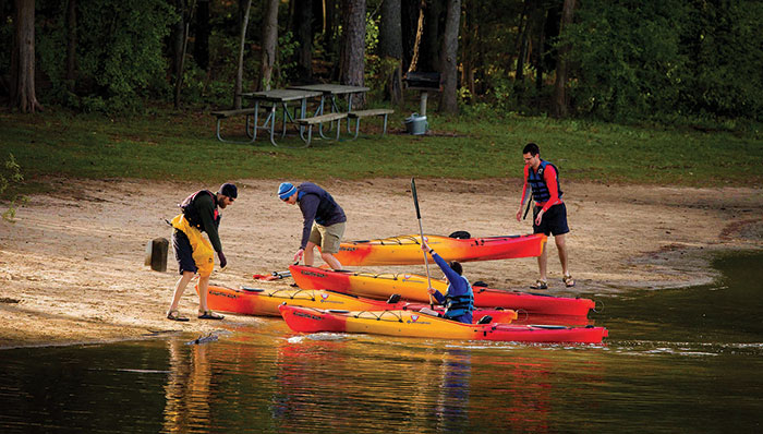 The scenic lake in Fred G. Bond Metro Park in Cary is a favorite with local kayakers, left. And if a pedal boat with the kids is more your speed, rentals are available. townofcary.org