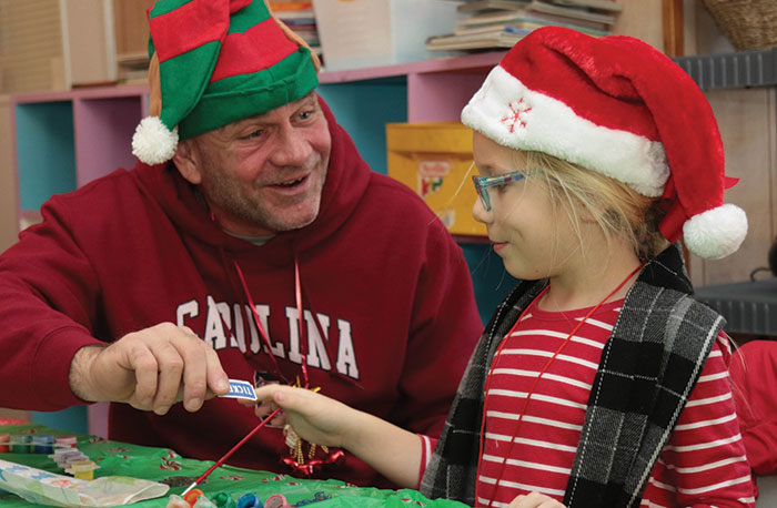 Supper with Santa’s elves and a holiday cookie contest are fun for the kids.