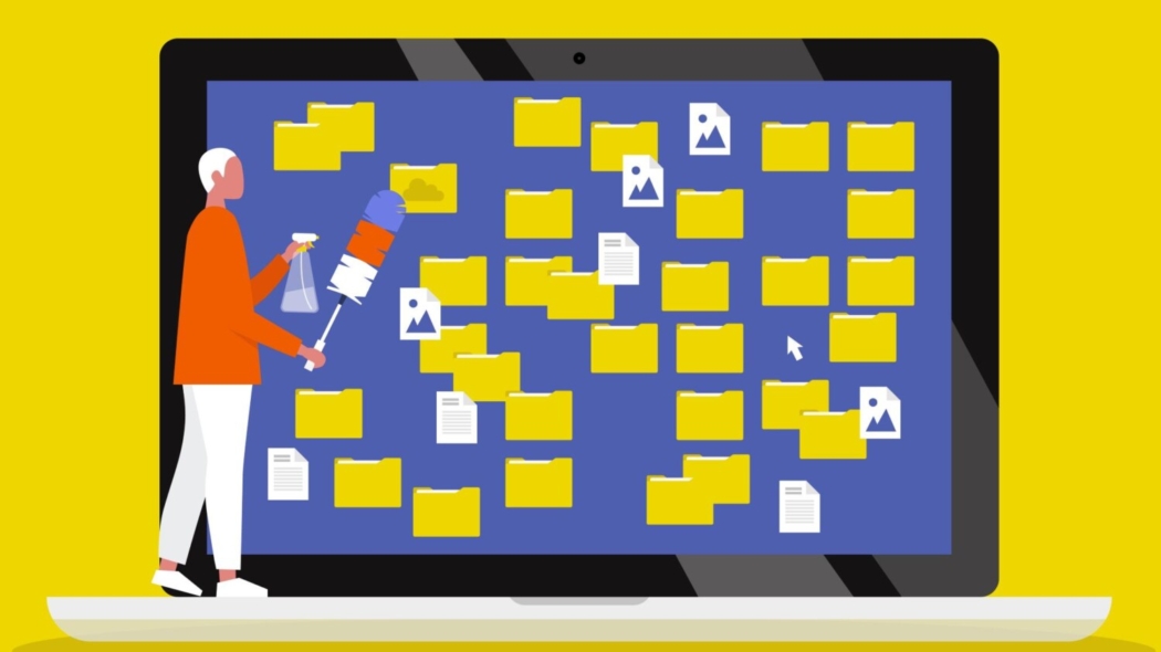 Illustration of a man standing on a laptop keyboard holding a spray bottle and scrub brush facing a screen filled with cluttered files.